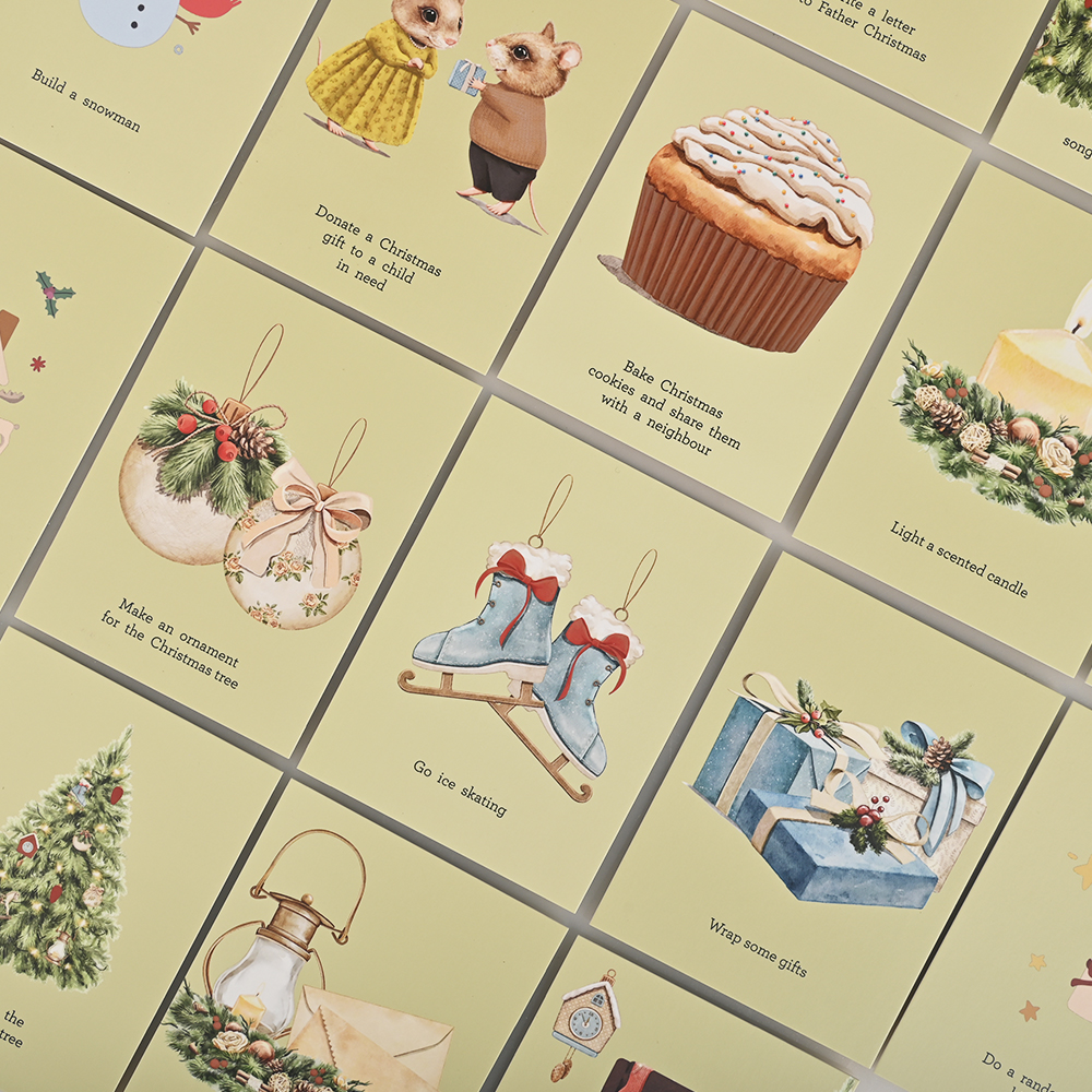 Multiple Christmas activity cards displayed with watercolor animal and holiday-themed illustrations.