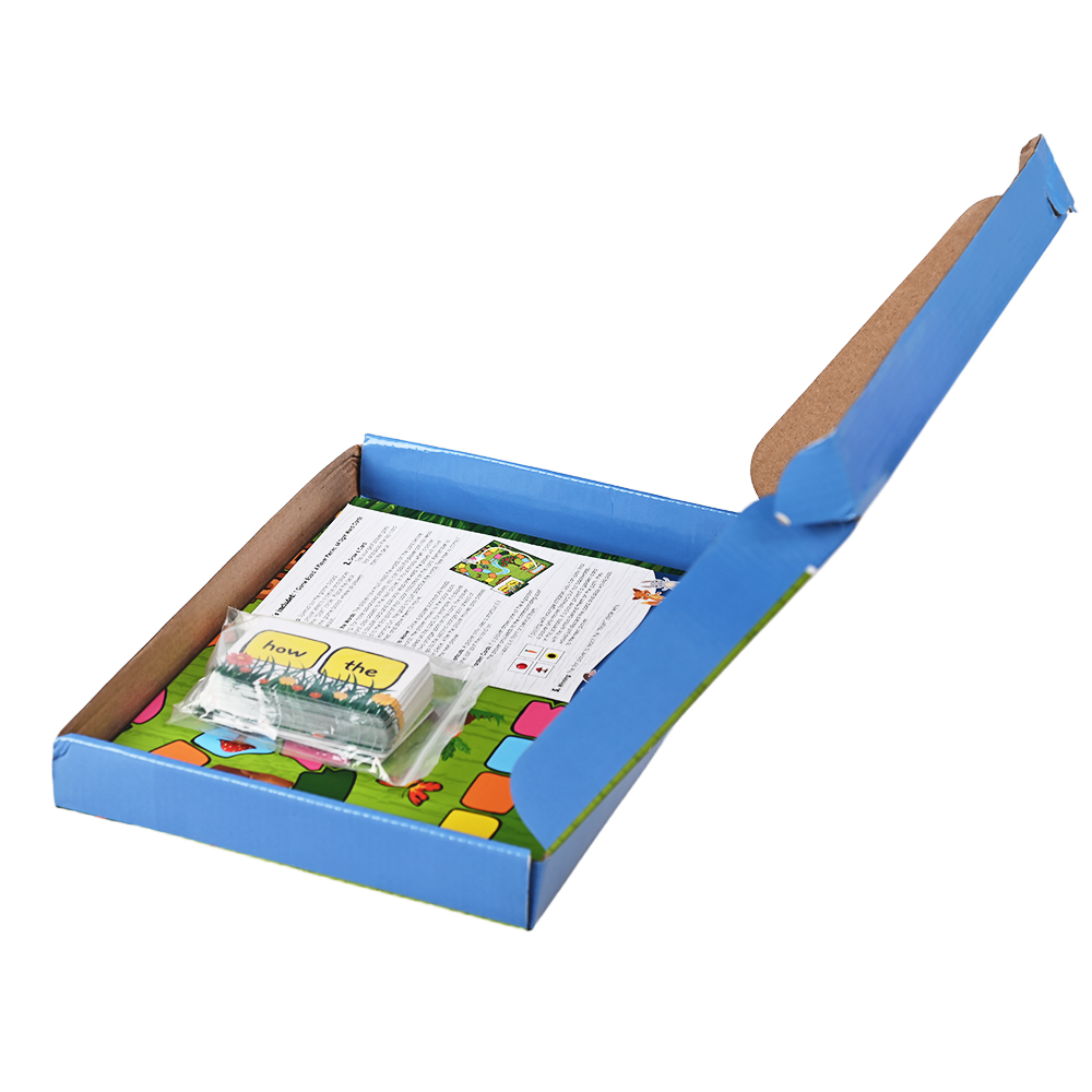 Juego de mesa de construcción de vocabulario con coloridos flashcards para estudiantes tempranos.