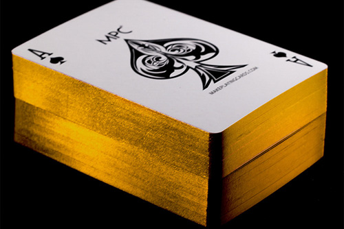 Elevate custom playing cards with premium edge grouting. Add metallic or colored finishes for durability. Expert custom card game printing for global brands.
