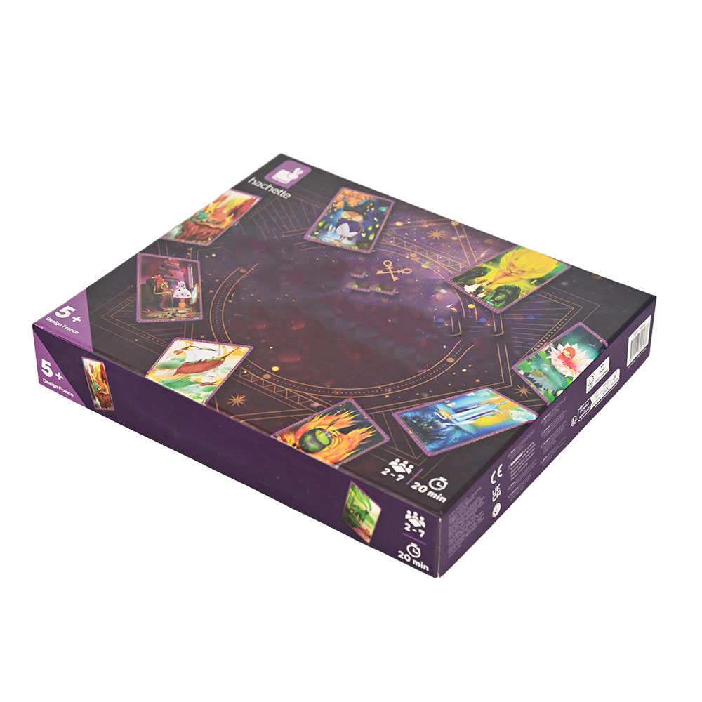Premium rigid cardboard game box manufacturing with vibrant purple finishes and gold foil details.