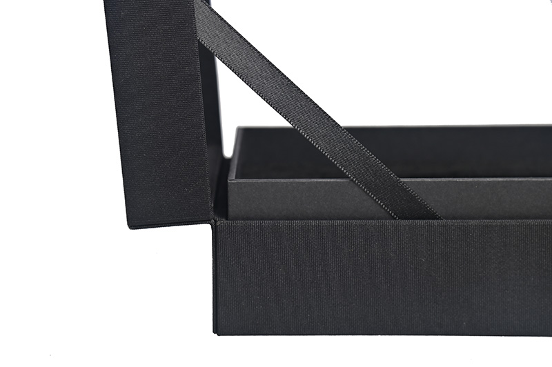 details of cardboard perfume box