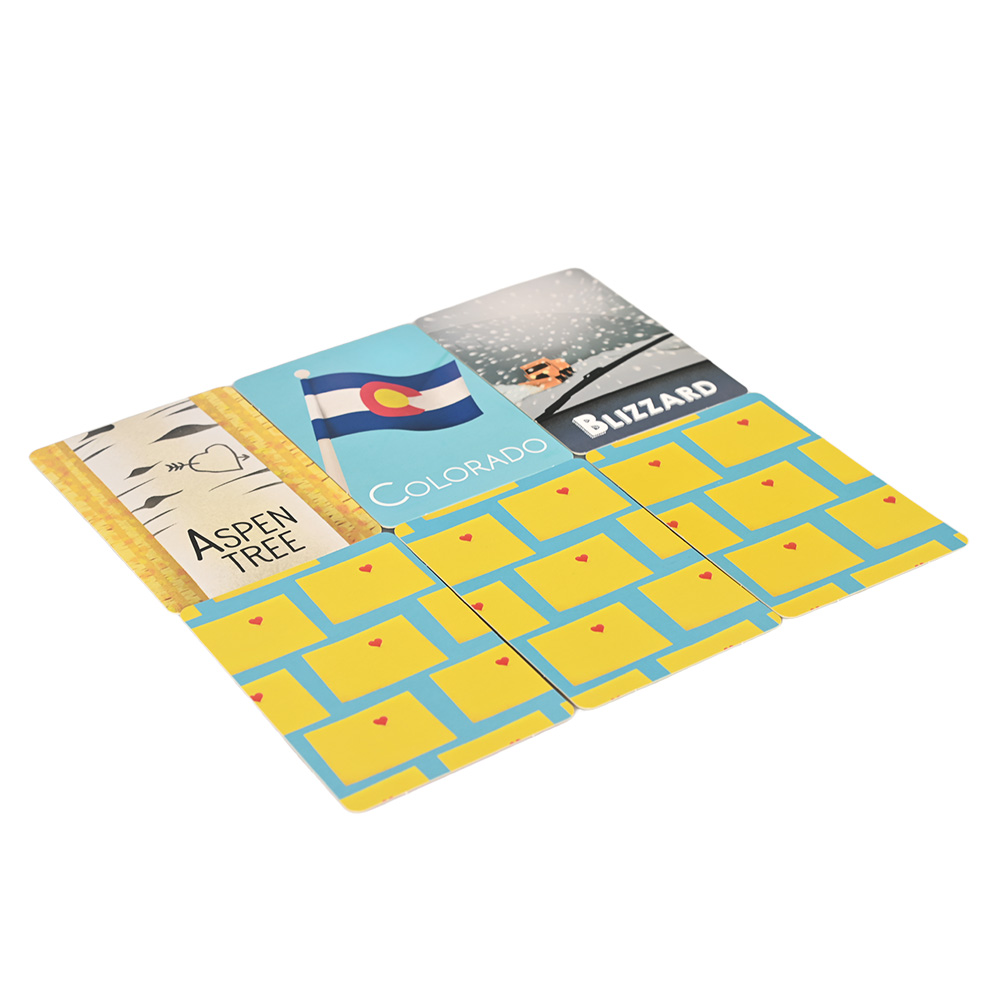 Durable thick cardstock flash cards with rounded corners for safe handling by children.