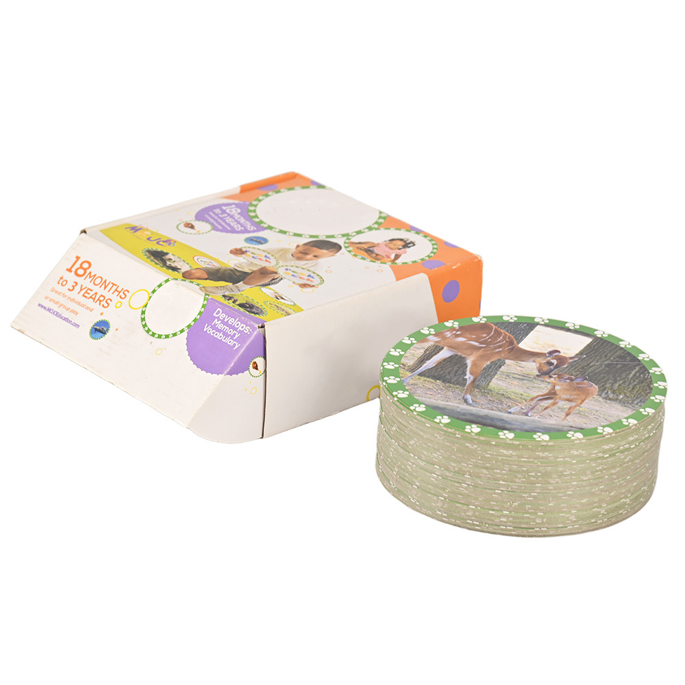 Round educational flash cards with real animal photography and green paw print border.