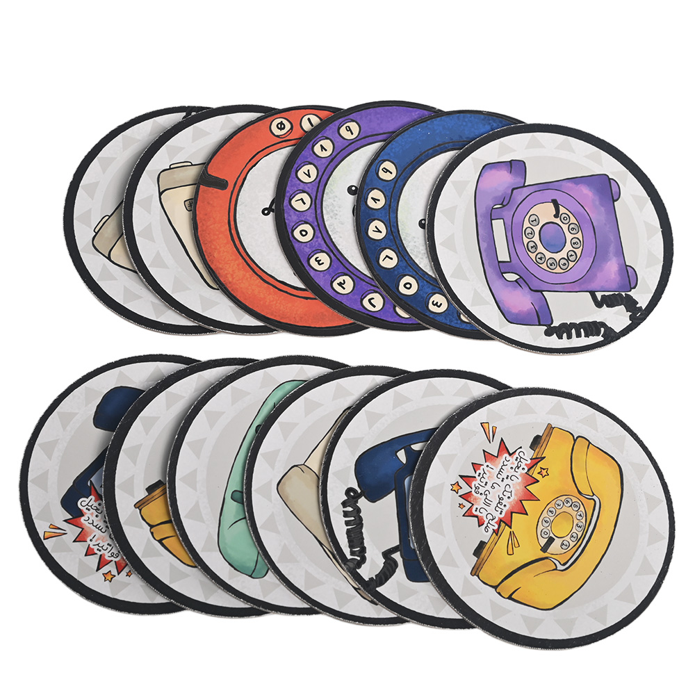 Close-up of glossy finish on custom printed circular cards for tabletop game challenge.