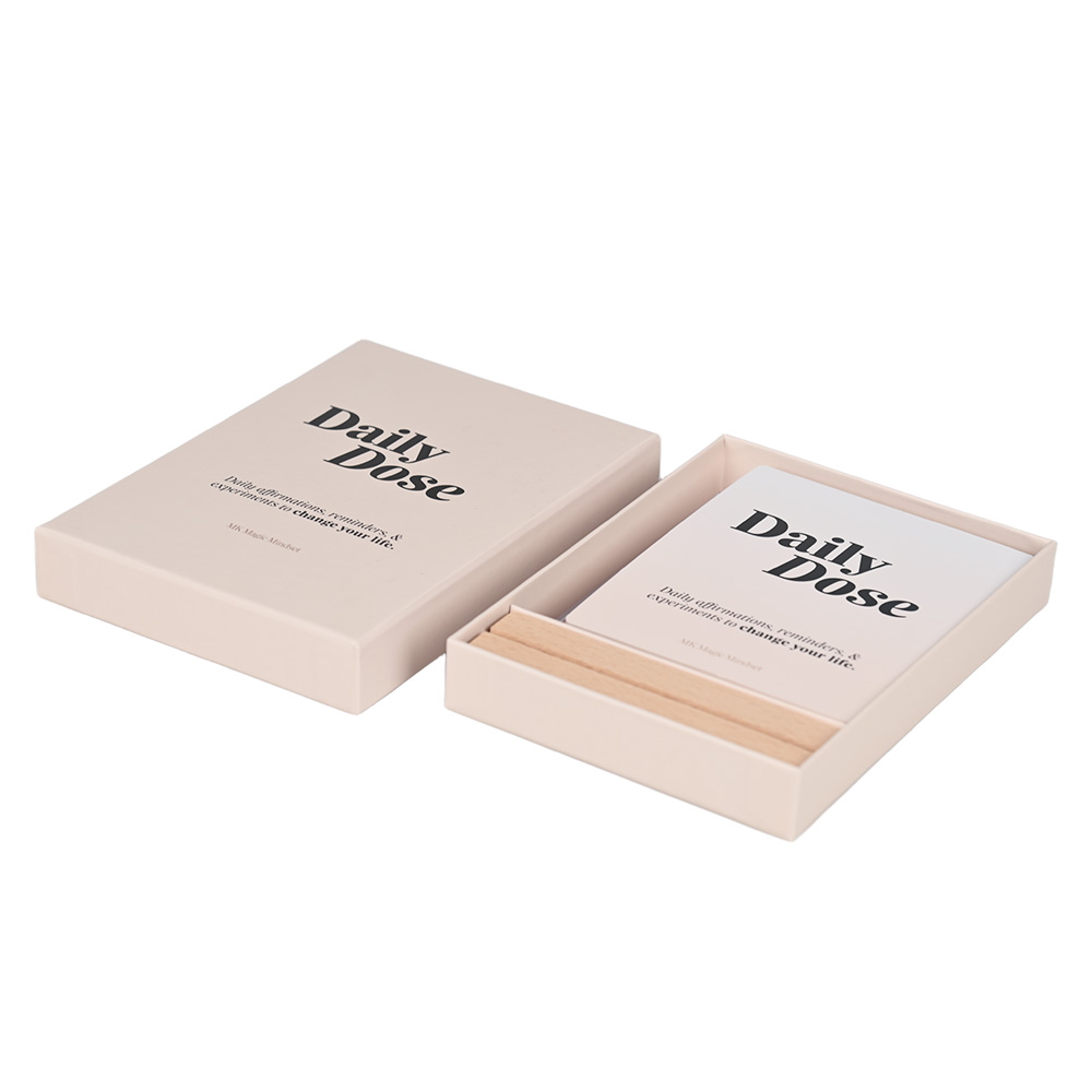 Open box showing Daily Dose cards and wooden card holder inside.