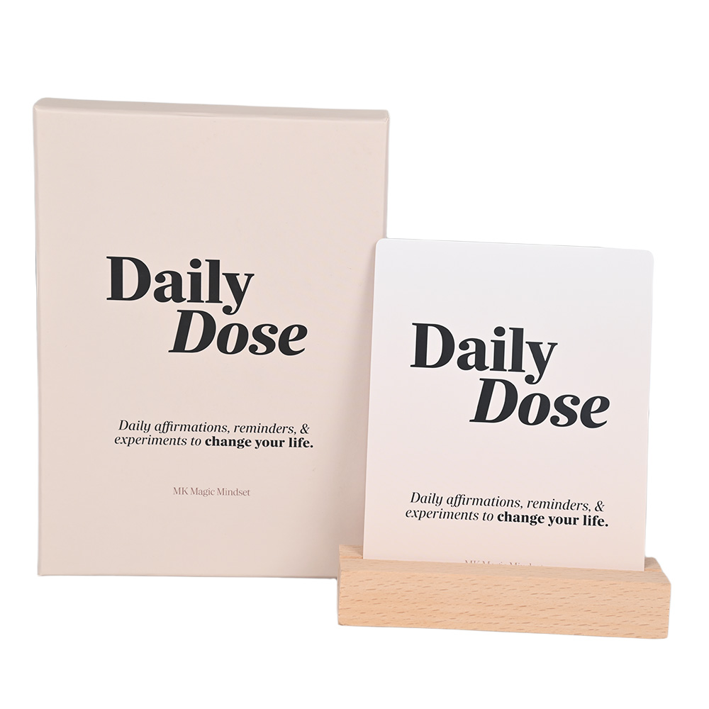 Minimalist design Daily Dose card deck box for personal growth and mindset shifting.
