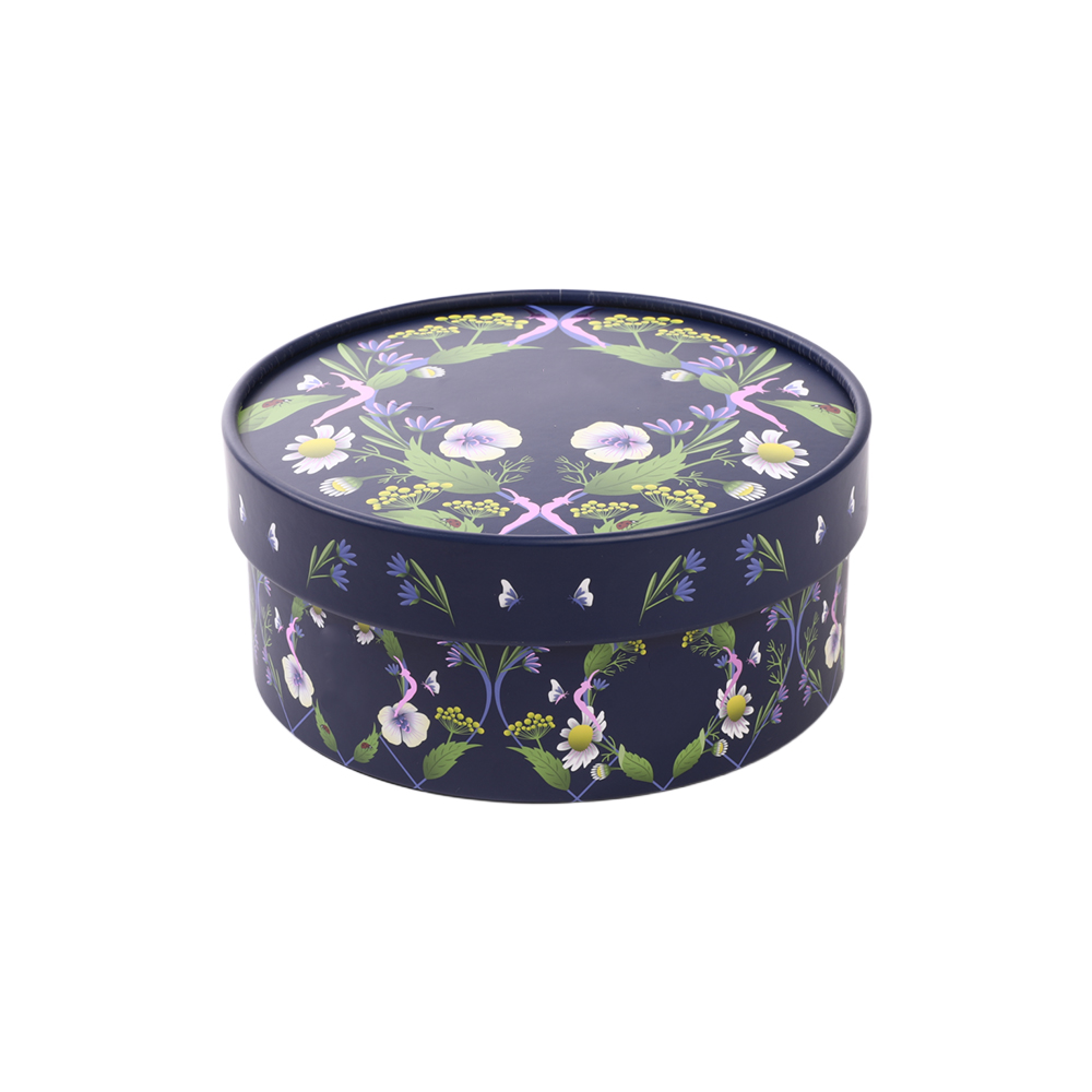 Custom cylindrical navy blue paper tea packaging box by Brothersbox