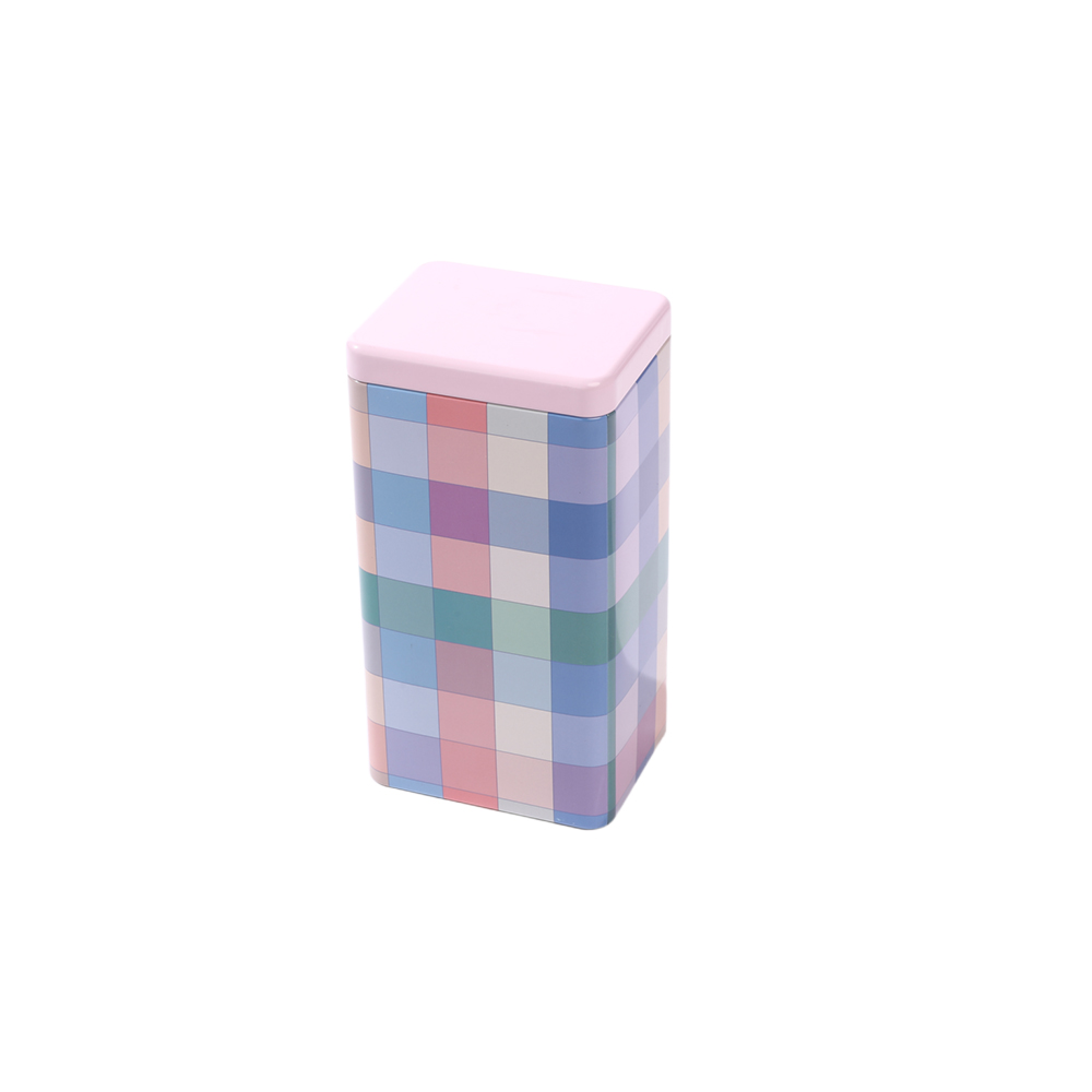 Boîte de conserve rectangulaire premium pour l'emballage de thé avec une esthétique pastel.