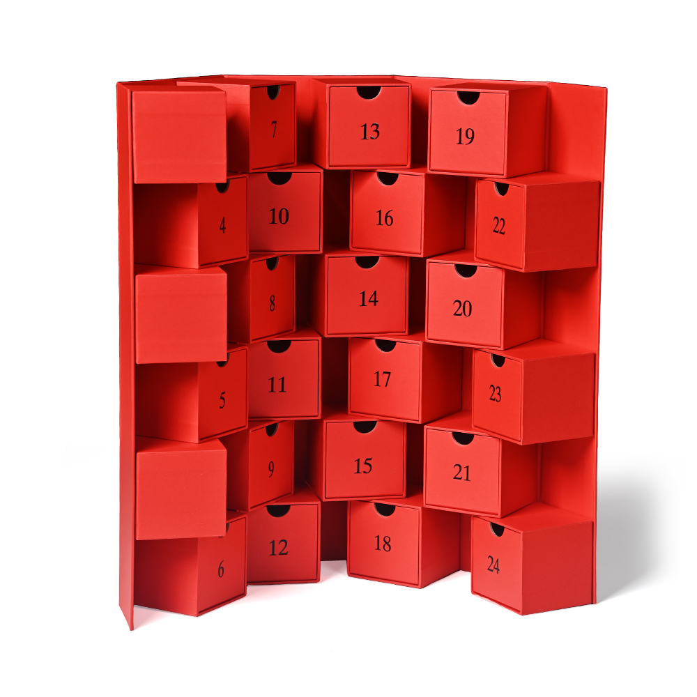 Red holiday gift advent calendar box opened to reveal numbered grids