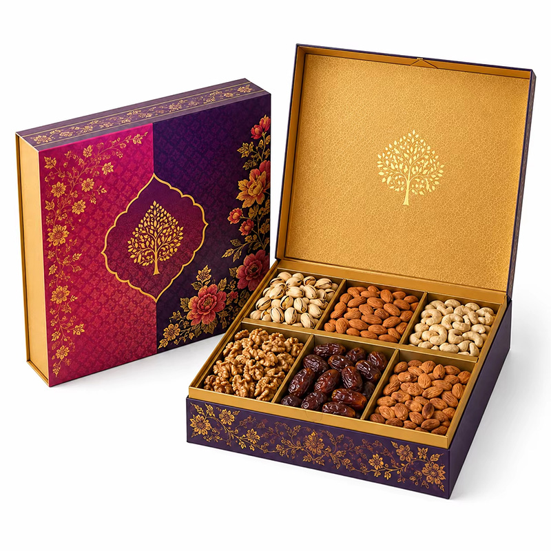 Luxury food gift packaging by Brothersbox filled with pistachios, almonds, walnuts, cashews, and dates.