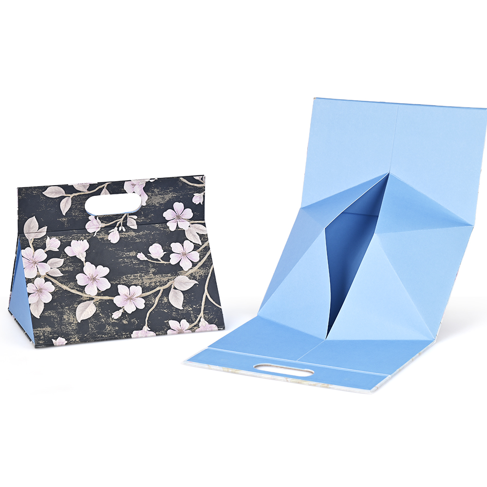 花柄プリントで、型抜きhandledのある折りたたみ式三角柱ギフトボックス。