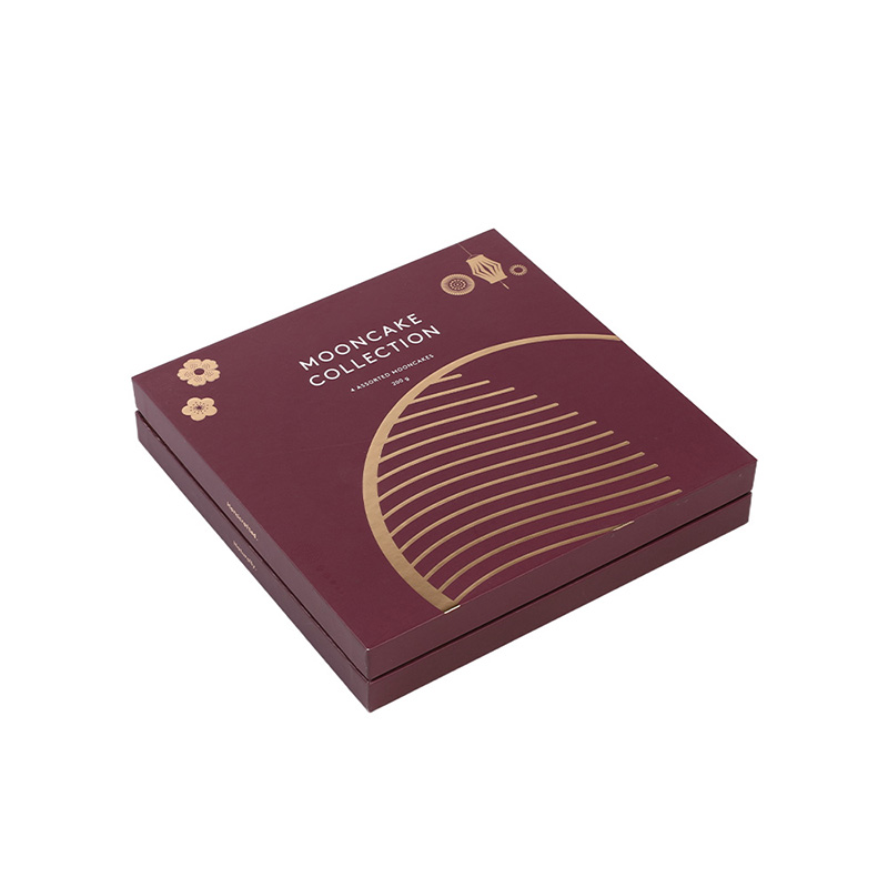 Top-down flat-lay view of a closed deep red traditional mooncake packaging gift box with gold details.