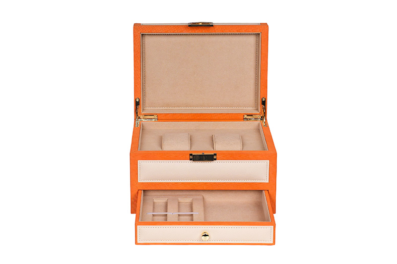 Vista frontal de la caja abierta de colección de relojes de dos niveles que revela cojines suaves y cajón vacío