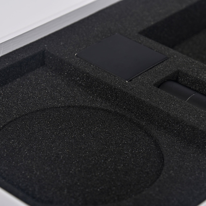 Close-up of high-density black foam insert in custom PR gift box