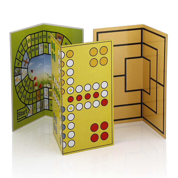Multiple foldable board game designs including Snakes and Ladders, Backgammon, and Nine Men's Morris.