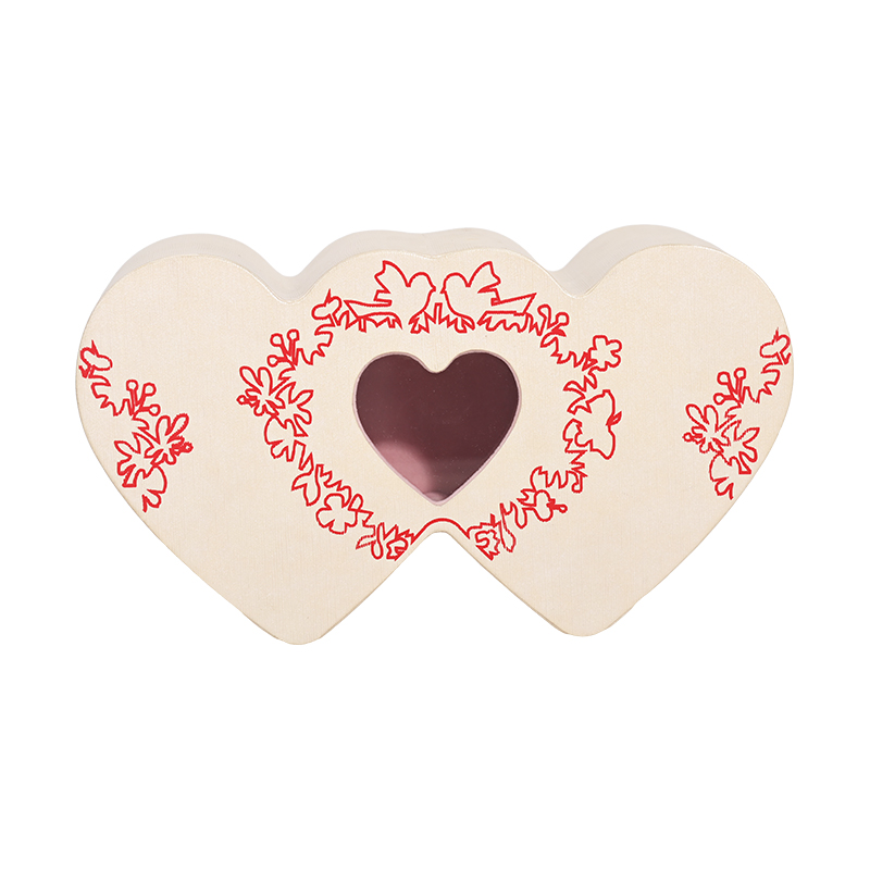 Overlapping double-heart shaped box with die-cut window and red floral print.