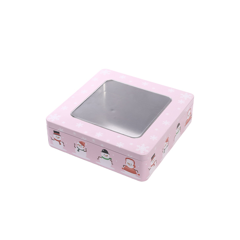 pink square Christmas tin cookie box with transparent window lid, featuring snowman patterns