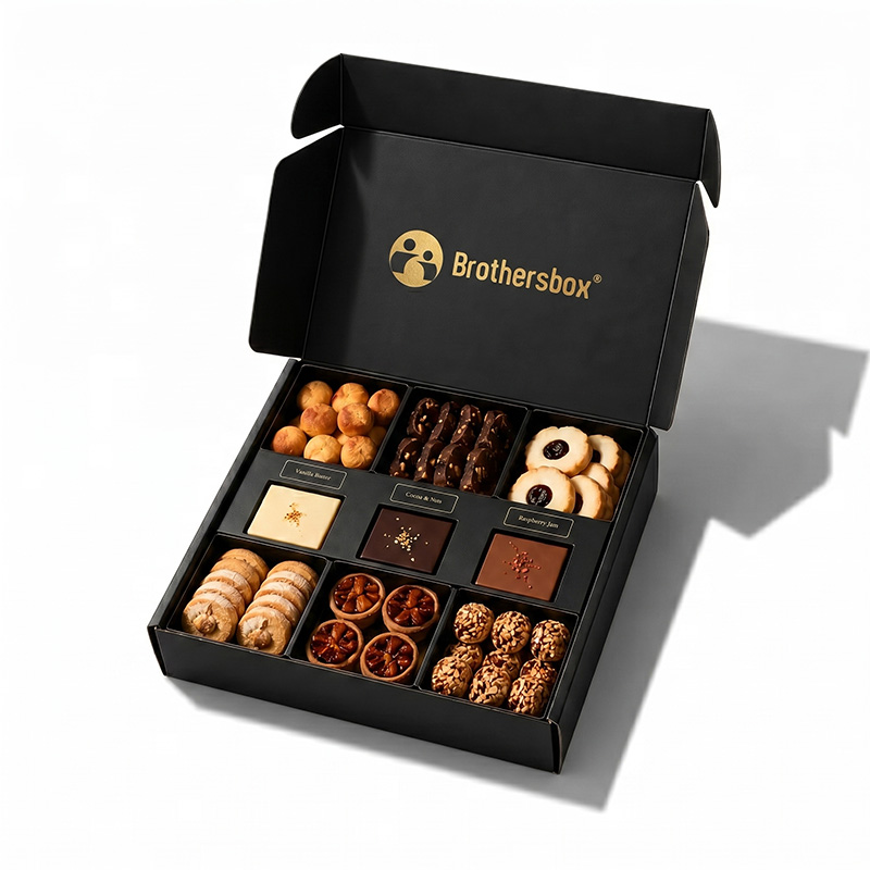 Perspective view of a custom black mailer style dry fruits box with multi-compartments.