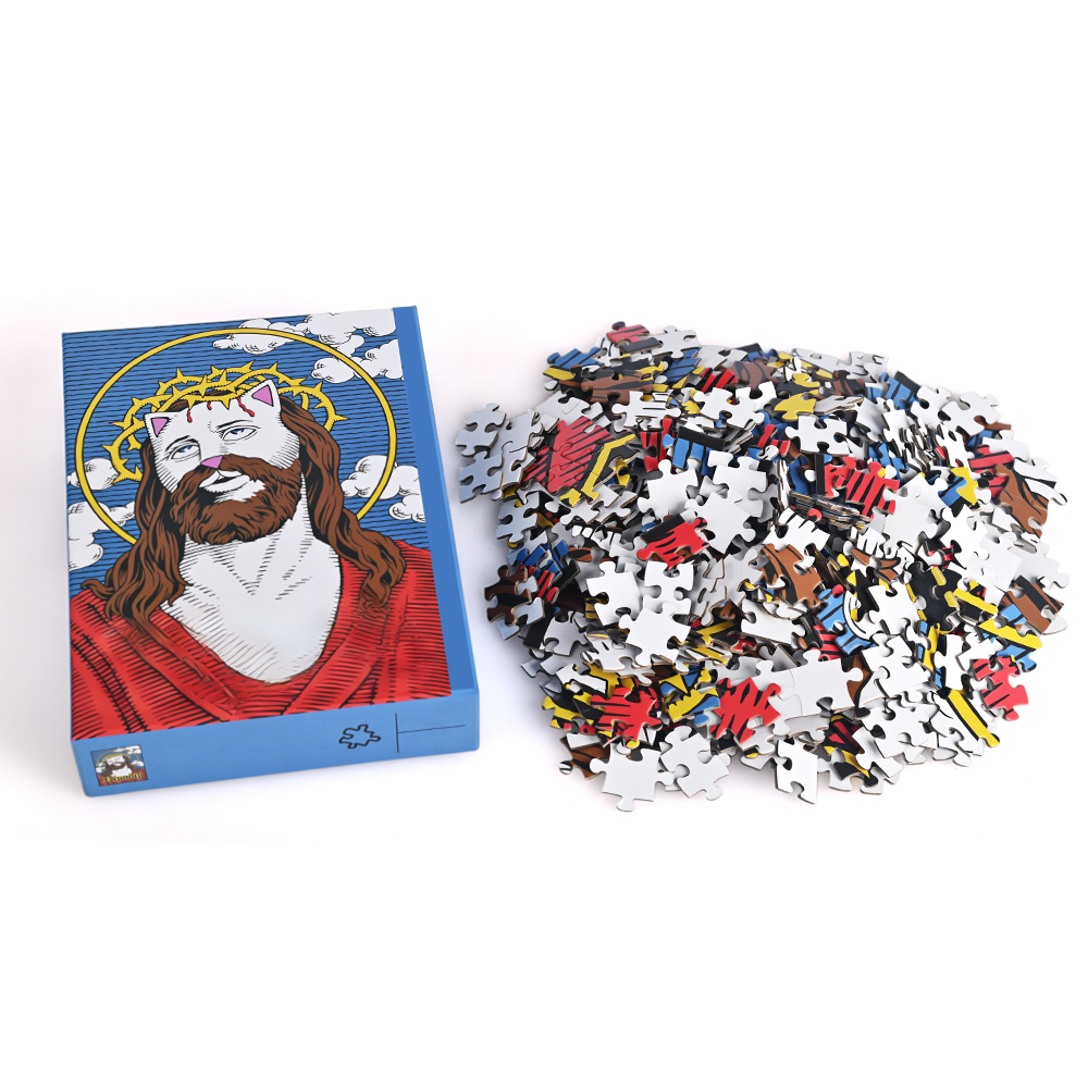 Top-down view of 500 piece personalized puzzle pieces and custom branded box.