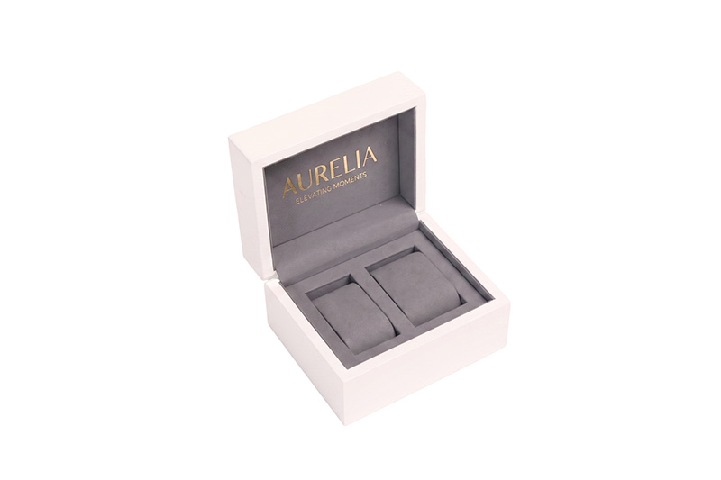 Custom luxury watch packaging interior showing two removable suede pillows