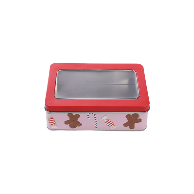 pink rectangular Christmas tin cookie box with a red lid and transparent window